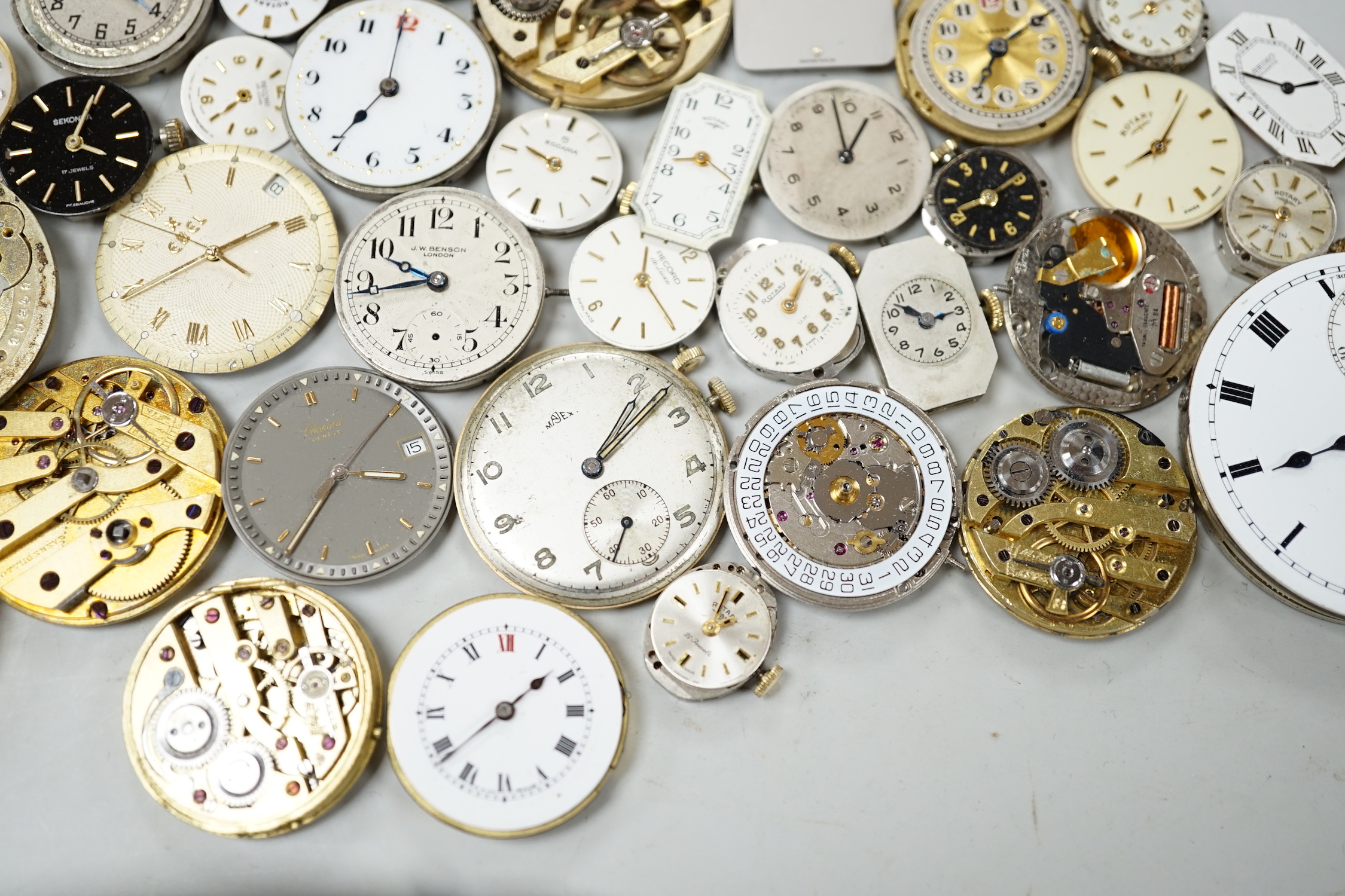 A quantity of assorted wrist and pocket watch parts and movements.